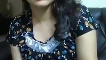 A Young Woman From India Who Has A Big Breasts And Two Large Ones Is Having Video Chat With Her Boyfriend.