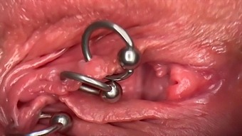 Macro Close-Up Of A Pierced Clit And Wet Pussy With Peeing
